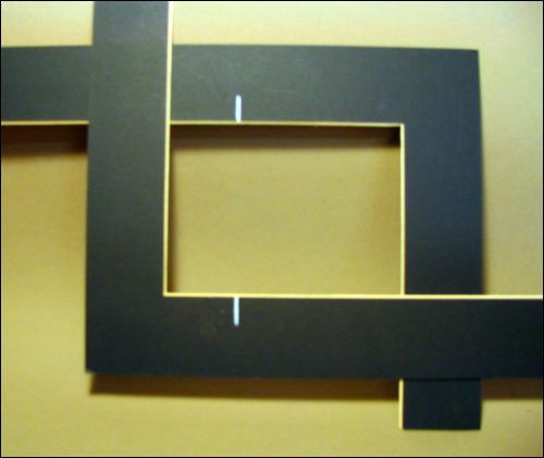 photo of two l-shaped pieces of matboard used to make a rabatment viewfinder